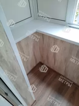 Холодное остекление и отделка П-образного балкона