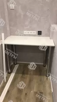 Отделка балкона гипсокартоном и ламинатом с установкой шкафа и тумбы