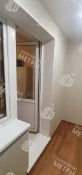 Остекление балкона и балконного блока профилем Rehau 60 и отделка панелями ПВХ